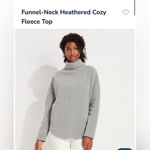 Wrap yourself up in this chic heathered funnel-neck fleece top!